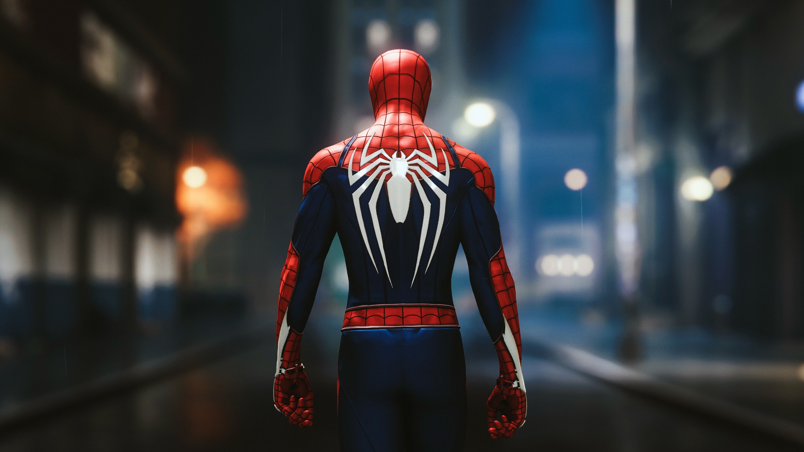 Spider-Man standing in a neon city street at night